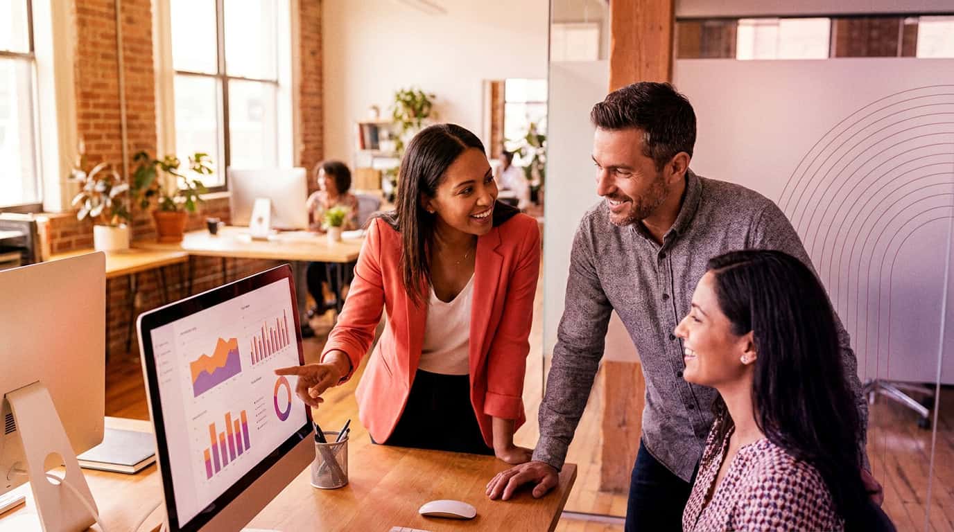 Small business team reviewing lead generation results together in a contemporary workspace